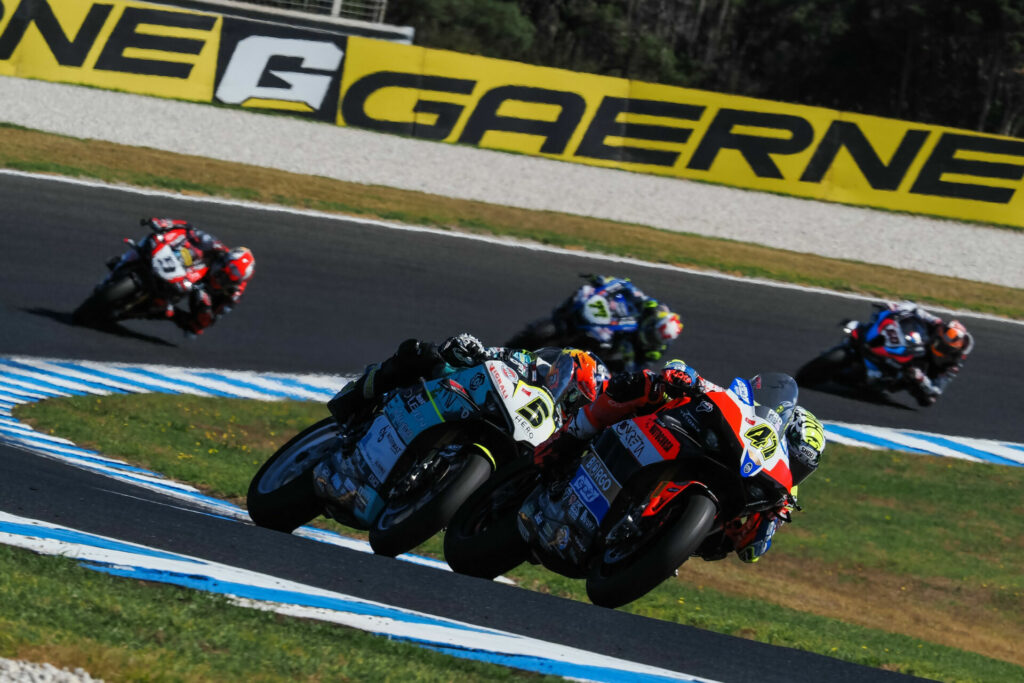 Axel Bassani (47) and Philipp Oettl (5) fight for position in Race Two. Photo courtesy Dorna.