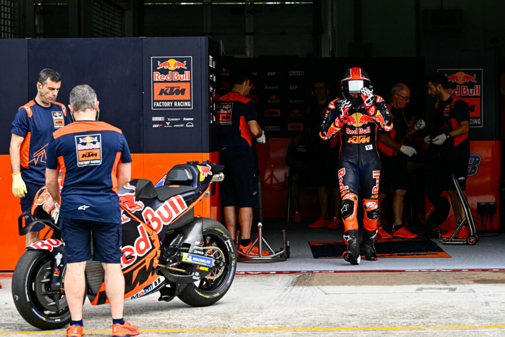 Jonas Folger walks to his KTM RC16. Photo courtesy Dorna.