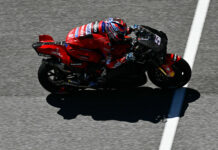Ducati test rider Michele Pirro (51) tucked in on a Desmosedici GP23 at Sepang. Photo courtesy Dorna.