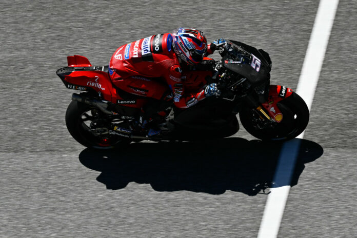 Michele Pirro (51) tucked in on a Ducati Desmosedici GP23. Photo courtesy Dorna. Ducati test rider Michele Pirro (51) tucked in on a Desmosedici GP23 at Sepang. Photo courtesy Dorna.