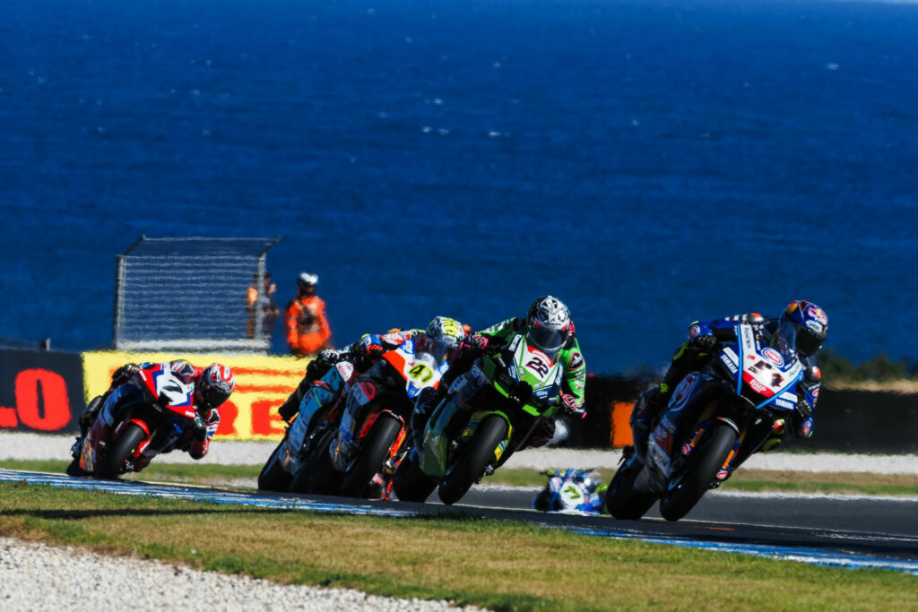 Toprak Razgatlioglu (54) leads Alex Lowes (22), Axel Bassani (47), and others during Race Two. Photo courtesy Dorna.