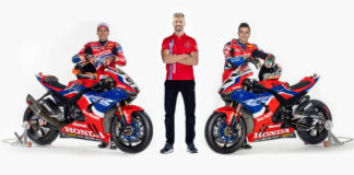 Team HRC Honda riders Xavi Vierge (left) and Iker Lecuona (right) with Team Manager Leon Camier. Photo courtesy Team HRC.