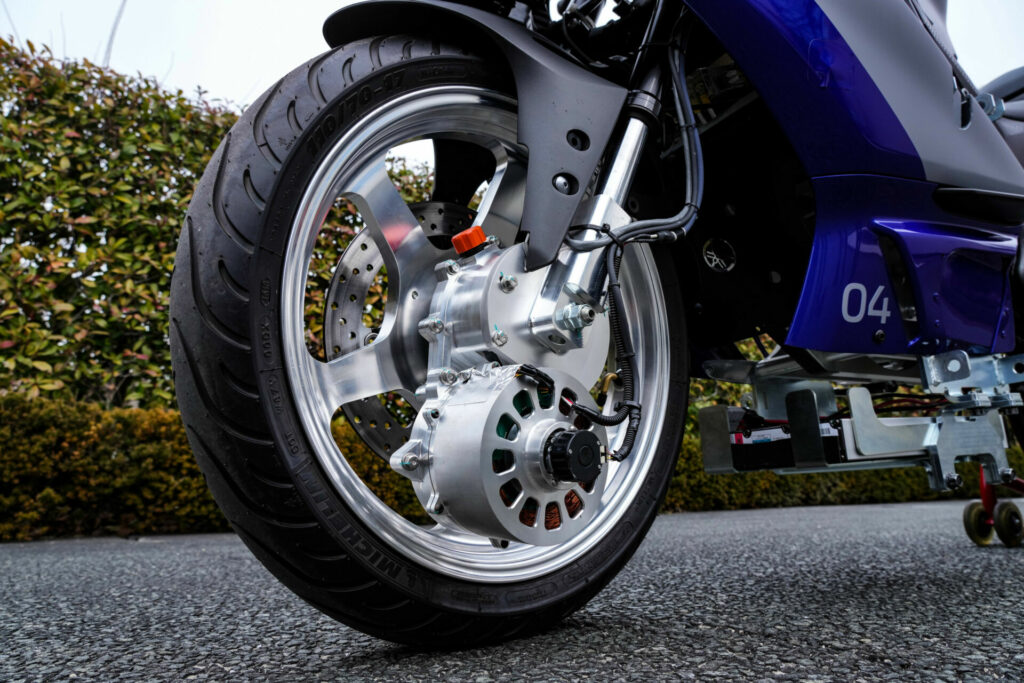 Yamaha's Advanced Motorcycle Stabilization Assist System (AMSAS) YZF-R25 test mule has a drive actuator on the front wheel. Photo courtesy Yamaha.