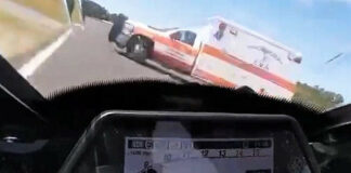 An ambulance crossing the front straightaway during a race March 19 at Roebling Road Raceway, as seen from the on-board camera on Daniel Alexander's motorcycle.