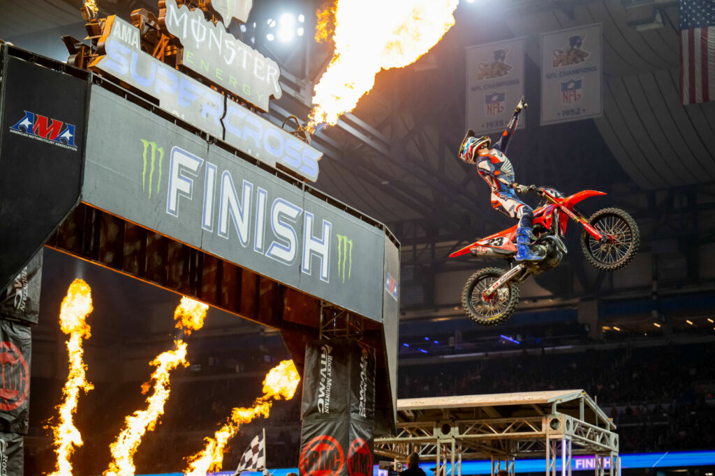 Chase Sexton (23) battled forward from a mid-pack start to win a thrilling Detroit Supercross and take his second win of the year. Photo courtesy Feld Motor Sports, Inc.  