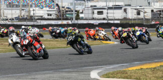 Josh Herrin (1), Danny Eslick (69), PJ Jacobsen (66), Richie Escalante (54), Cameron Petersen (45), Josh Hayes (4), and the rest of the field during the start of the 81st Daytona 200. Photo by Brian J. Nelson.