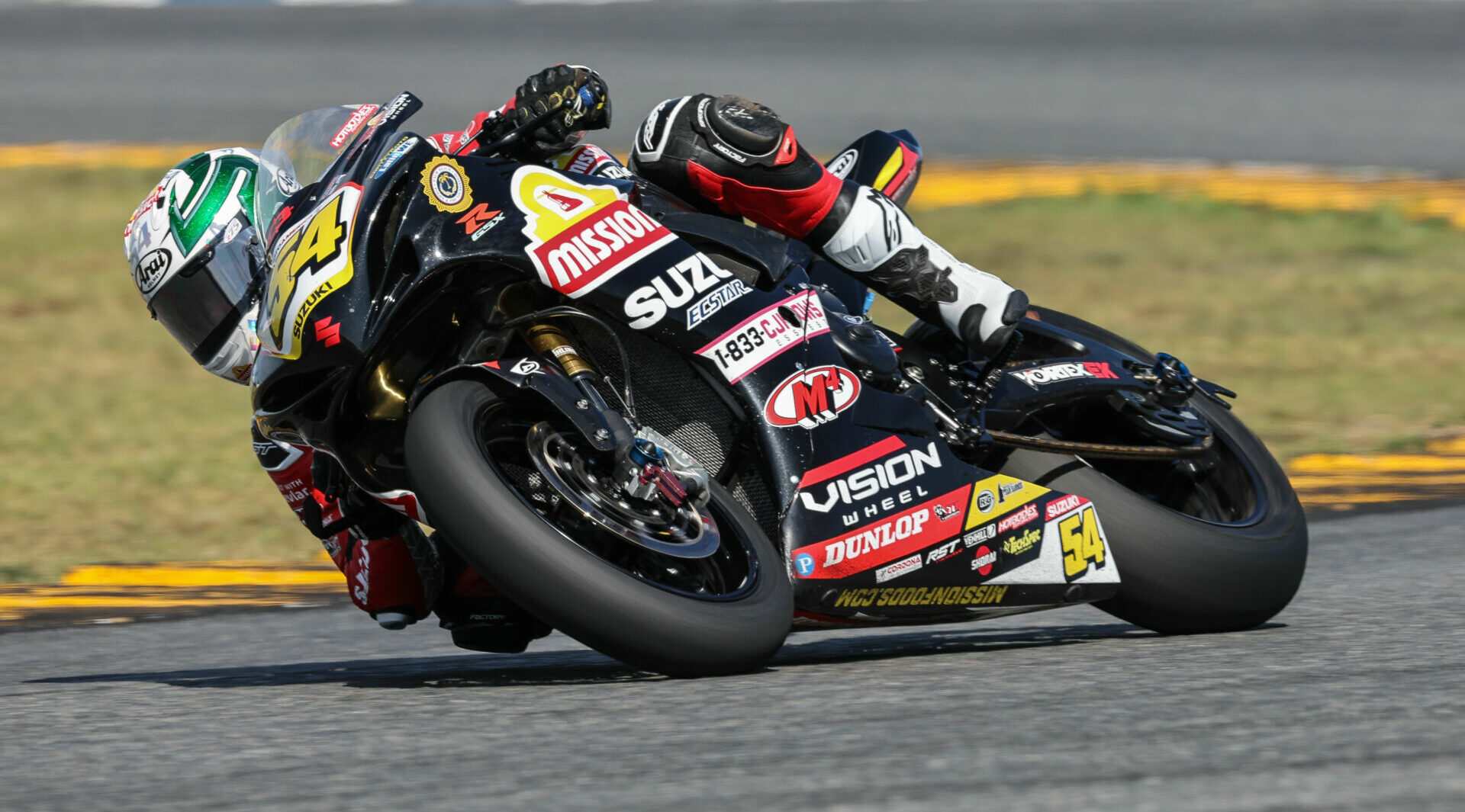 Richie Escalante (54) at speed on his Vision Wheel M4 ECSTAR Suzuki GSX-R750. Photo by Brian J. Nelson.