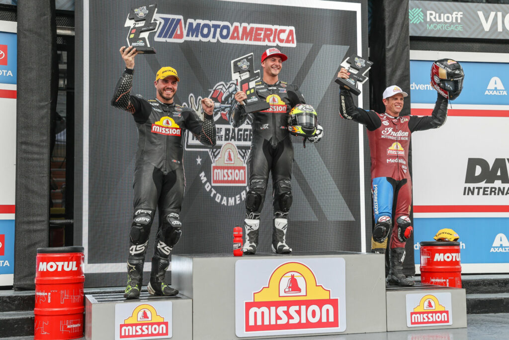 Mission King Of The Baggers winner James Rispoli (center) is flanked in Victory Lane by teammate Hayden Gillim (left) and Tyler O'Hara (right). Photo By Brian J. Nelson, courtesy MotoAmerica.