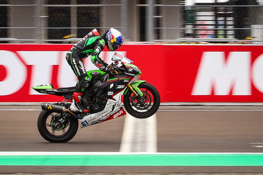 Can Oncu (61) wheelies across the finish line to win World Supersport Race One in Indonesia. Photo courtesy Dorna.