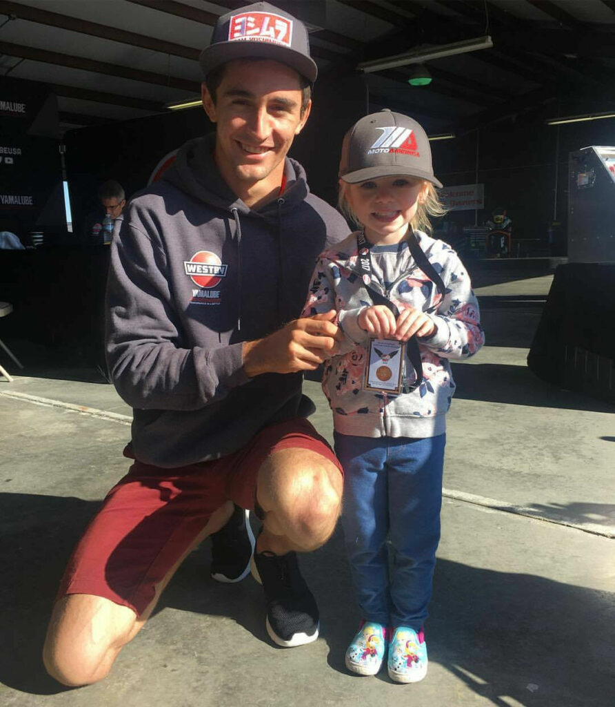 Westby Racing's Mathew Scholtz with a young Wing Warrior. Photo courtesy Westby Racing.