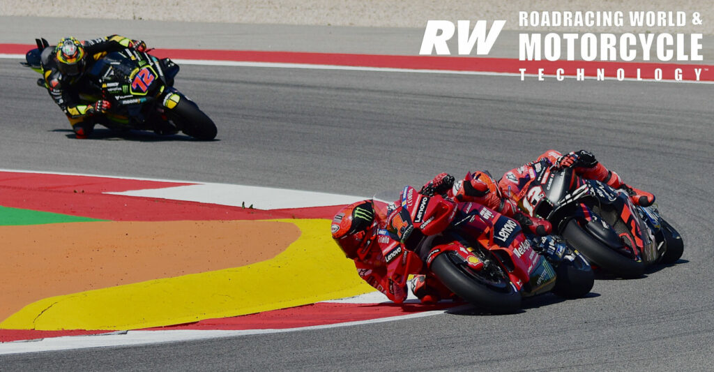 Francesco “Pecco” Bagnaia (1) led Maverick Vinales (12) and Marco Bezzecchi (72) across the line after a fraught MotoGP race saw several of the front-runners on the ground and out of the race. Photo by Michael Gougis.