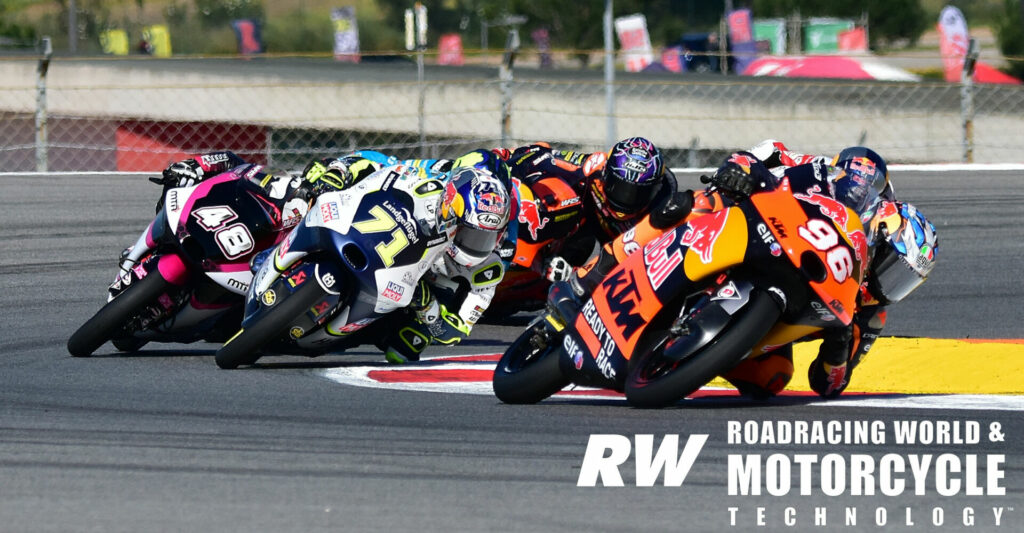 Holgado: Daniel Holgado (96) led Ayumu Sasaki (71) and Ivan Ortola (48) at the beginning of the Moto3 race in Portugal. Holgado won, with Sasaki sixth and Ortola a lap down. Photo by Michael Gougis.