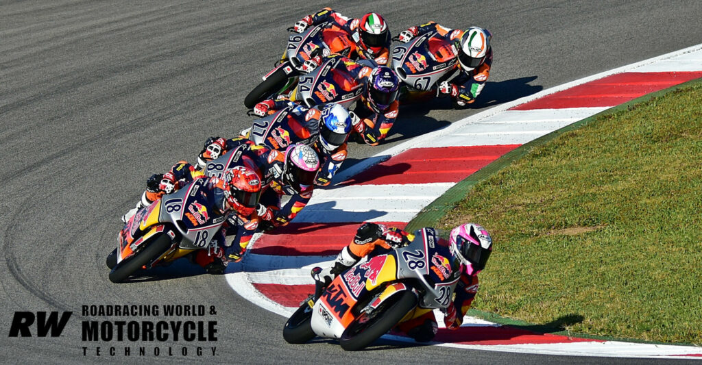 Rookies Cup: Máximo Quiles (28) leads eventual race winner Angel Piqueras (18) in the second Red Bull MotoGP Rookies Cup race in Portugal. Photo by Michael Gougis.