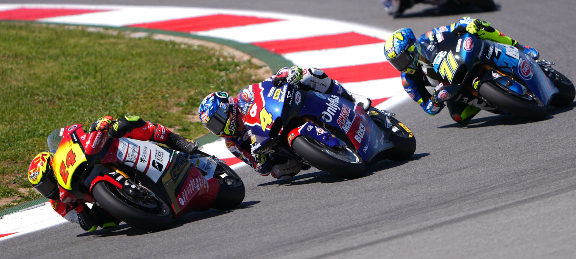 American Sean Dylan Kelly (4) fights with Marcos Ramirez (24) and Dennis Foggia (71) for top-20 positions in the Moto2 race in Portugal. Photo courtesy American Racing Team.