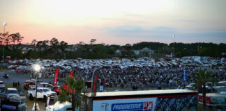 Another view of the motorcycle parking area Thursday night at the American Flat Track (AFT) Daytona Short Track I at Daytona International Speedway.
