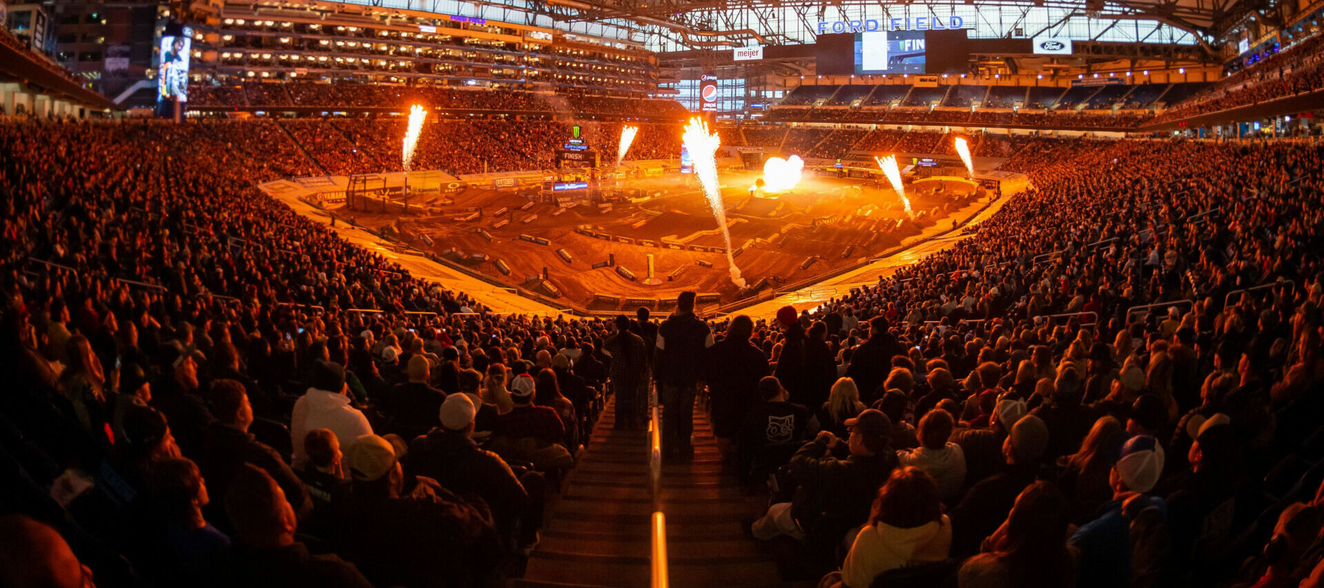 The Detroit Supercross kept race fans on their feet with a 450SX Class Main Event filled with multiple surprises and passes, as well as a dramatic late-race crash. Photo courtesy Feld Motor Sports, Inc.