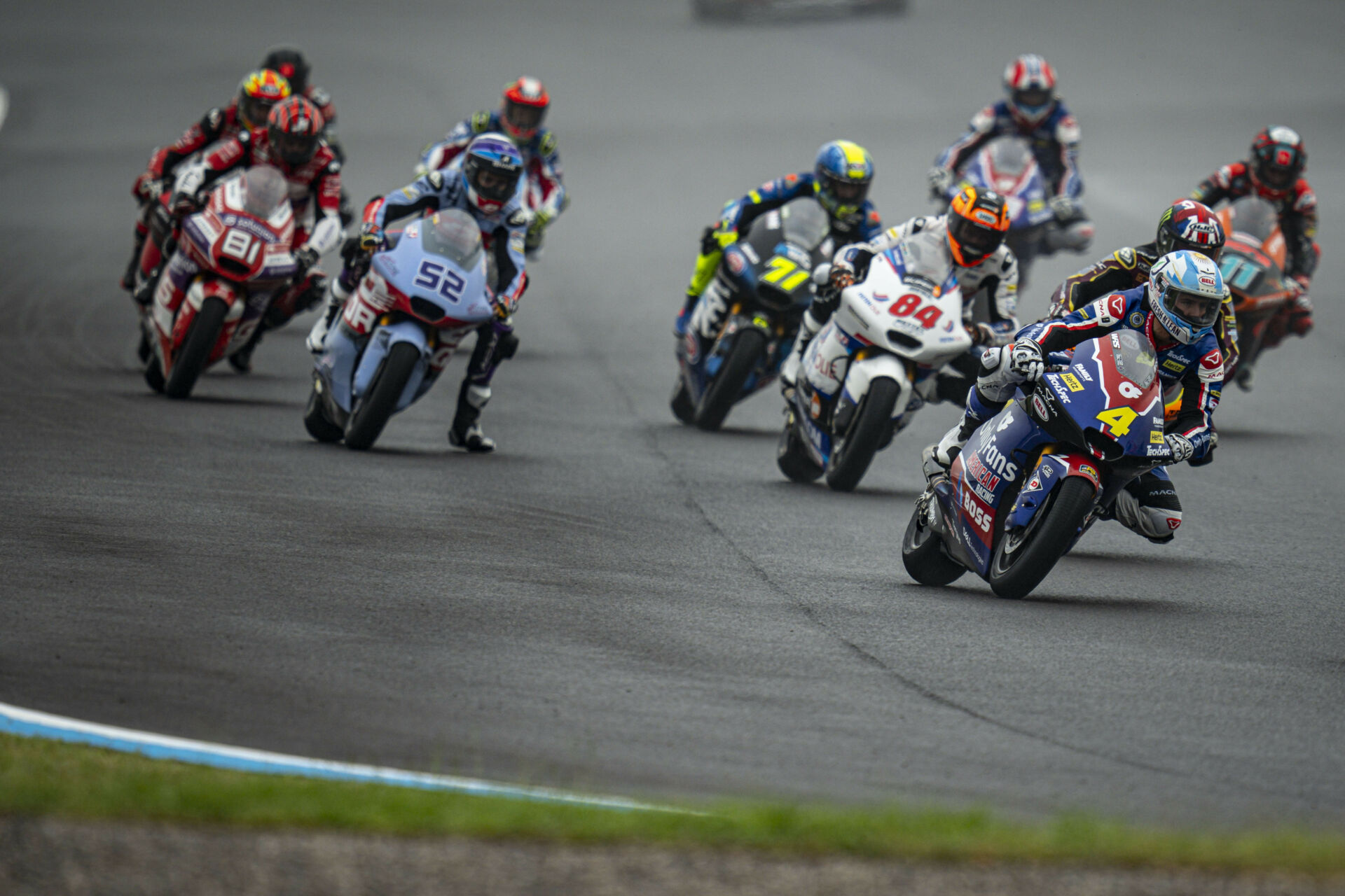 Sean Dylan Kelly (4) leads Sergio Garcia (11), Zonta VD Goorbergh (84), Dennis Foggia (71), Jeremy Alcoba (52), Jordi Torres (81), and several others at the start of the wet, shortened Moto2 race in Argentina. Kelly DNF. Garcia finished fifth. Photo courtesy American Racing Team.