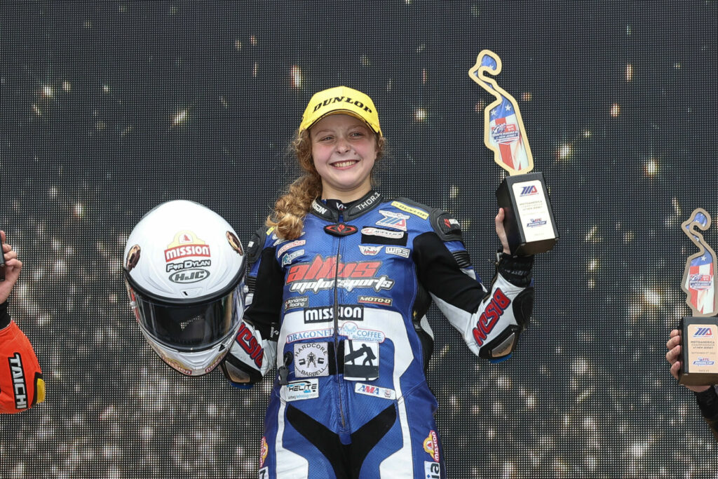 Kayla Yaakov on the MotoAmerica Junior Cup podium in New Jersey. Photo by Brian J. Nelson.