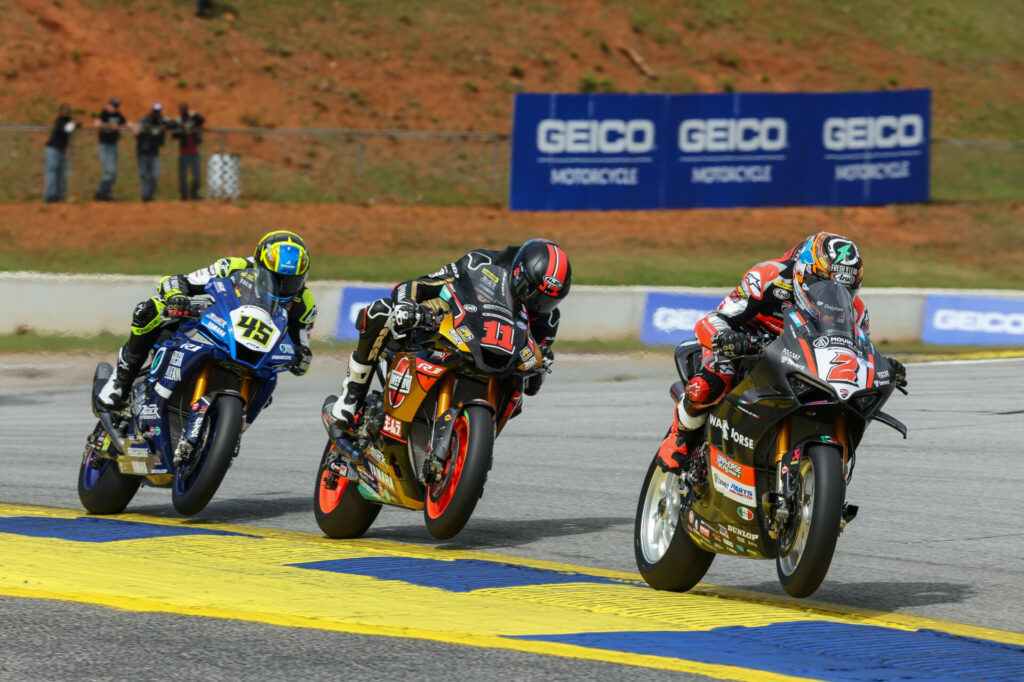 Josh Herrin (2), Mathew Scholtz (11), and Cameron Petersen (45) battle during Superbike Race One. Photo by Brian J. Nelson, courtesy Westby Racing.