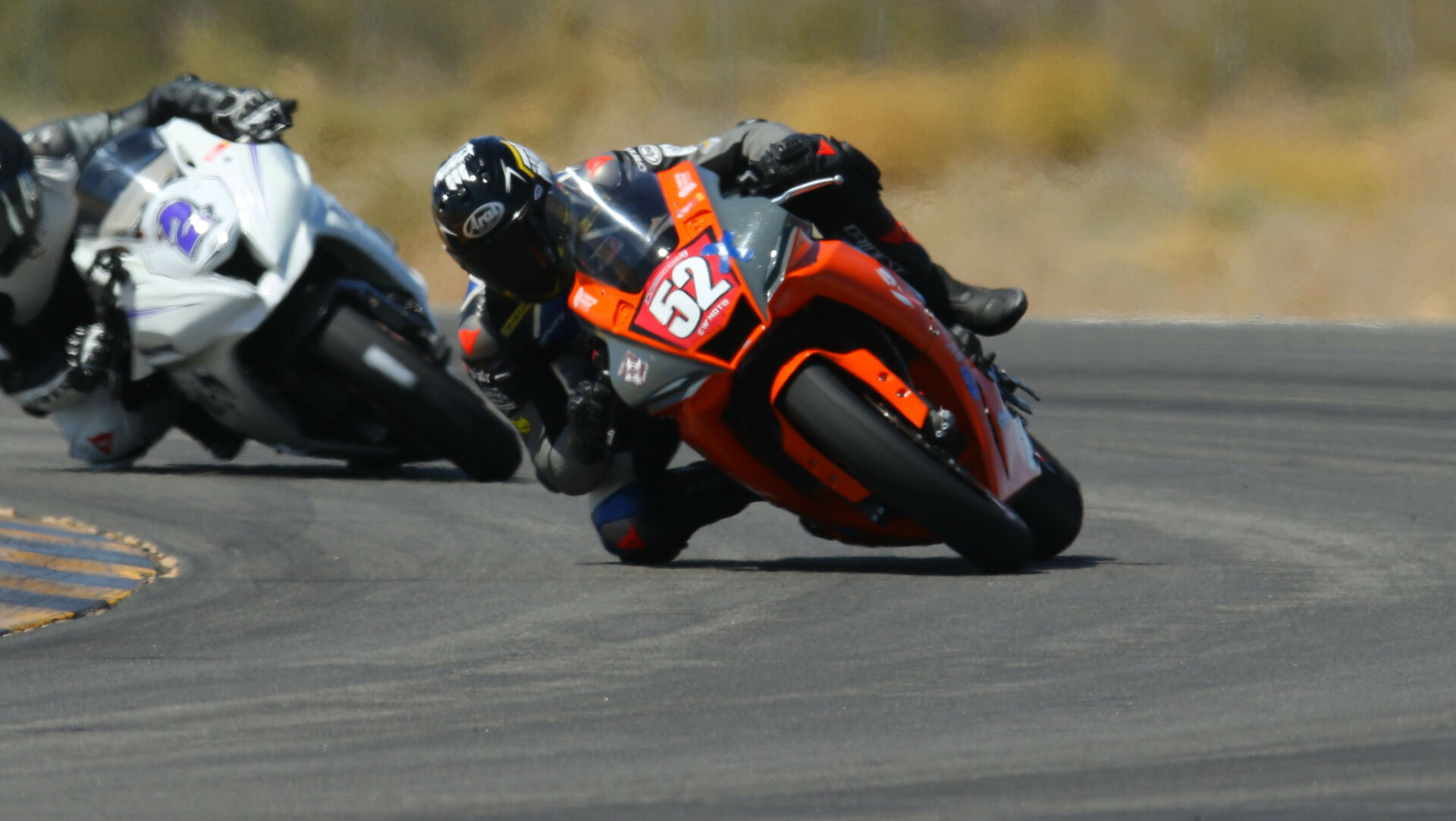 Benjamin Smith (52) in action at Chuckwalla Valley Raceway. Photo by CaliPhotography, courtesy CW Moto Racing.