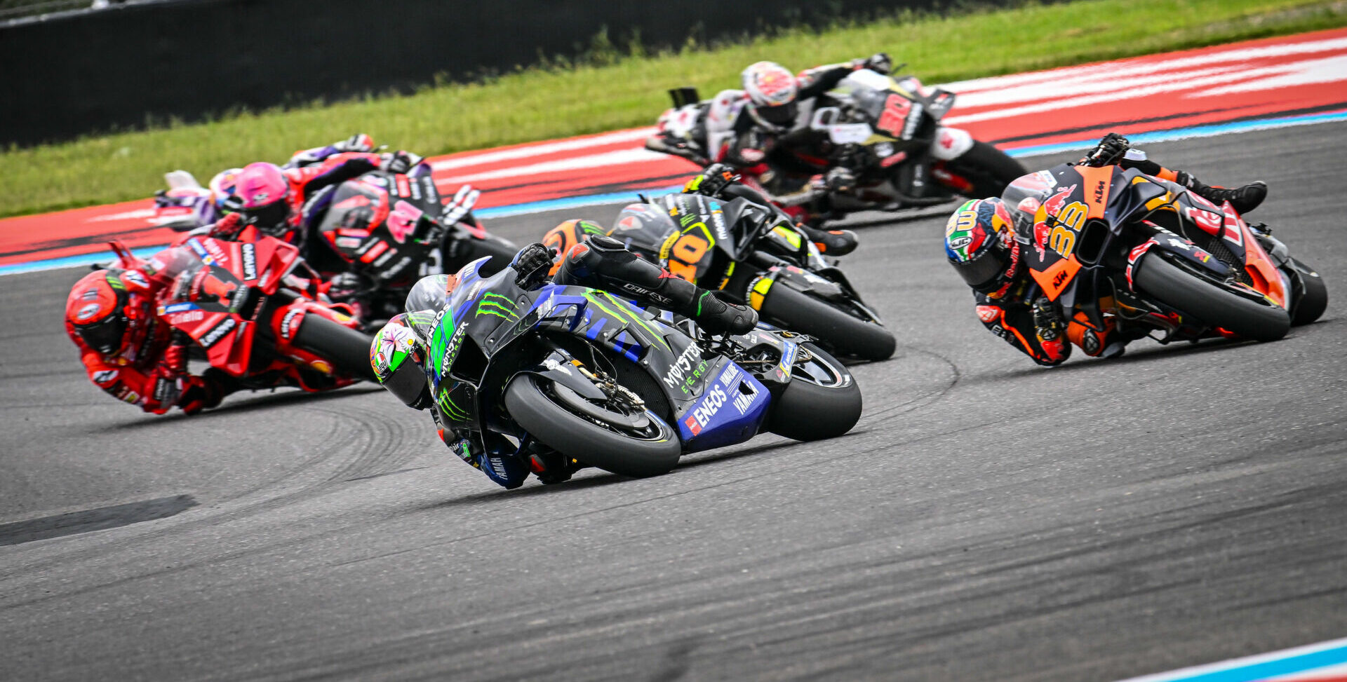 Fans who share their race predictions via MotoGP Guru will be eligible to win prizes and special experiences. Here, Franco Morbidelli (21) leads Brad Binder (33), Luca Marini (10), Francesco Bagnaia (1), Aleix Espargaro (41), and Takaaki Nakagami (30) during the Sprint in Argentina. Photo courtesy Monster Energy Yamaha.
