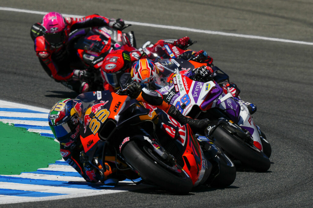 Brad Binder (33) leads Jorge Martin (89), Francesco Bagnaia (behind Martin), and Aleix Espargaro (41). Photo courtesy Dorna.