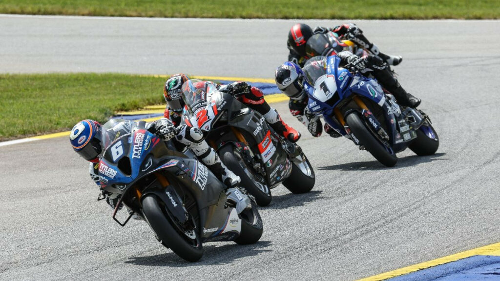 Cameron Beaubier (6) leads Josh Herrin (2), Jake Gagne (1) and Mathew Scholtz (11) in the final laps of what was a thrilling four-rider battle for victory. Photo by Brian J. Nelson.