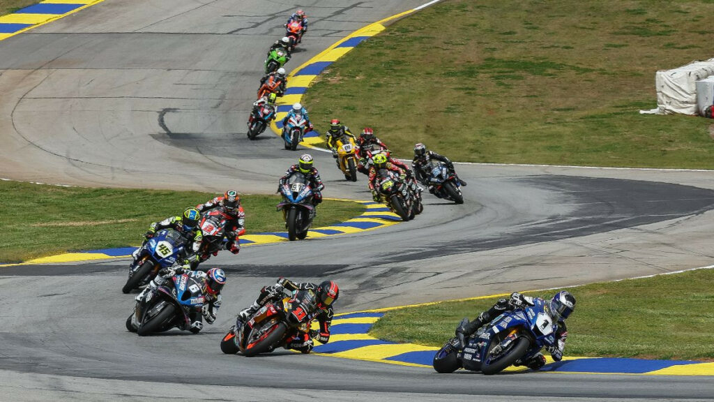 Jake Gagne (1) leads Mathew Scholtz (11), Cameron Beaubier (6), Cameron Petersen (45) and the rest of the Medallia Superbike pack on Saturday at Michelin Raceway Road Atlanta.Photo by Brian J. Nelson.