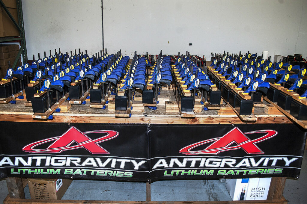“Small-Case” batteries typically used in racebikes and cars (like the 801 units seen being glued together here) are manufactured by Antigravity Batteries in California. Some of the company’s other products are designed and engineered in America, and then assembled in China.