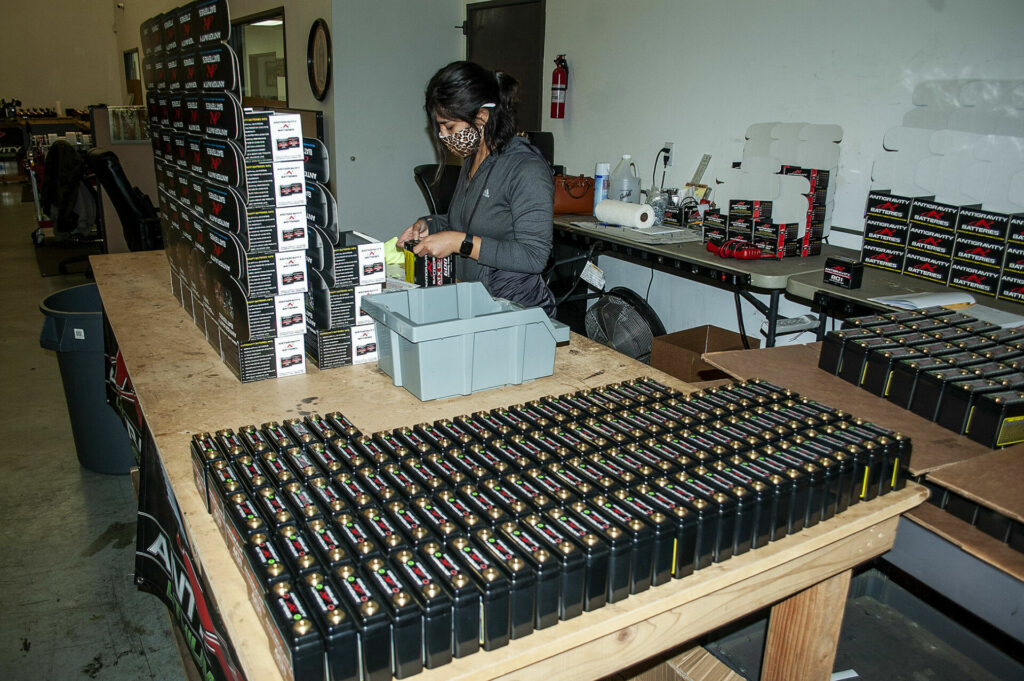 Antigravity Batteries manufactured in California are all tested, labeled, and packaged before being shipped, while products made in China arrive ready-to-ship to customers and dealers. Photo by David Swarts.