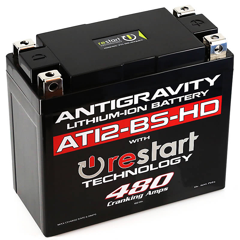 A push button in the center on top of an Antigravity Batteries Re-Start motorcycle battery activates its power reserve, while Re-Start models for cars come with a key fob to activate the reserve power. The four-terminal design is for flexibility in mounting. Plastic caps for unused terminals are included. Photo courtesy Antigravity Batteries. 