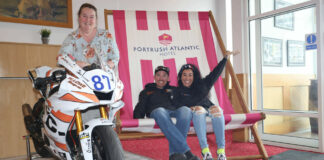 Cory West and Patricia Fernandez-West (seated) with Natasha Garrott (standing), the General Manager of the Atlantic Hotel in Portrush. Photo courtesy NW200 Press Office.