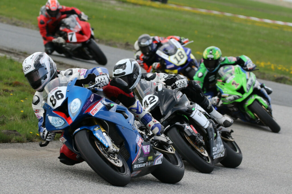 Ben Young (86) is the most recent Superbike race winner at Shannonville, narrowly fending off Kenny Riedmann (42), Jordan Szoke (1), Tomas Casas (18), and Jeff Williams (7) in 2019. Photo by Rob O'Brien, courtesy CSBK.