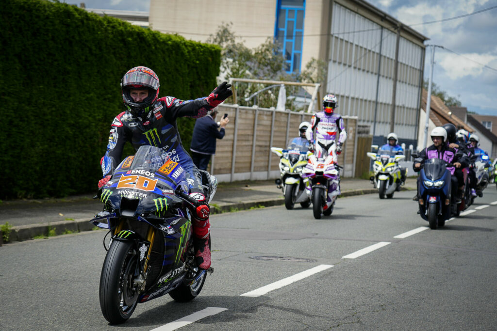 Fabio Quartararo (20) taking a turn leading the parade of motorcycles to the Bugatti Circuit. Photo courtesy Dorna.