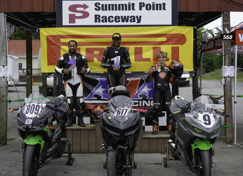 ASRA 400 race winner Mikayla Moore (center) on the podium with runner-up Luigi Mora (left) and third-place finisher Matthew Chapin (right). Photo by etechphoto.com, courtesy ASRA/CCS.