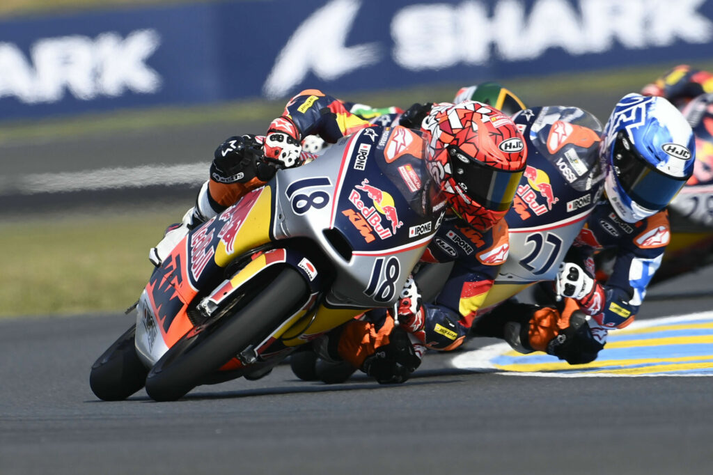 Angel Piqueras (18) leads Rico Salmela (27) during Red Bull MotoGP Rookies Cup Race One at Le Mans. Photo courtesy Red Bull.