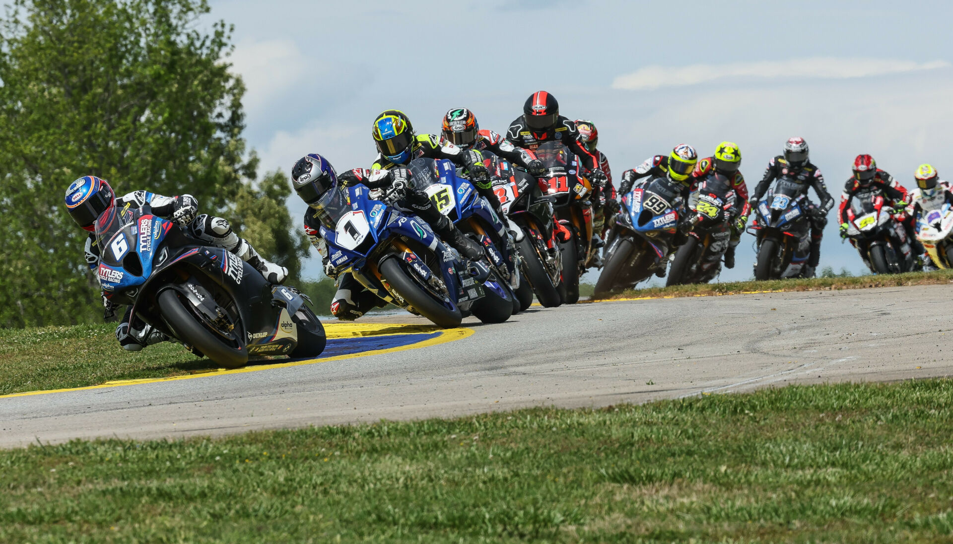 Cameron Beaubier (6) leads Jake Gagne (1), Cameron Petersen (45), Josh Herrin (2), Mathew Scholtz (11), Richie Escalante (behind Scholtz), PJ Jacobsen (66), Toni Elias (24), Corey Alexander (23), David Anthony (25), and Ashton Yates (22) during MotoAmerica Superbike Race Two at Road Atlanta. Photo by Brian J. Nelson.