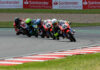 American Julian Correa (40) fought for the lead in both British Talent Cup races at Donington Park. Here, the Floridian chases teammate Harrison Dessoy (55), who won Race Two. Correa was a close fourth. Photo courtesy Dorna.