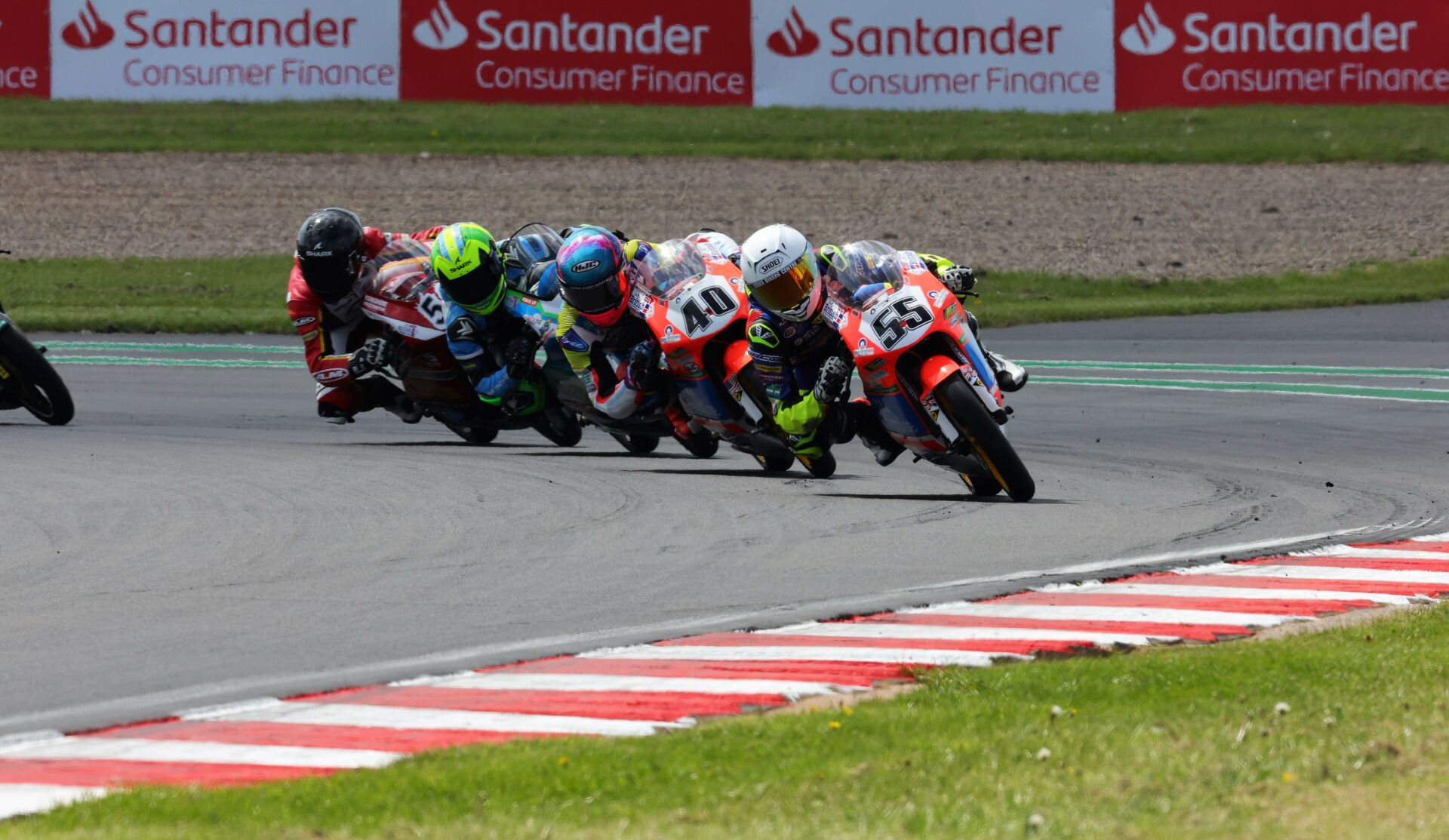 American Julian Correa (40) fought for the lead in both British Talent Cup races at Donington Park. Here, the Floridian chases teammate Harrison Dessoy (55), who won Race Two. Correa was a close fourth. Photo courtesy Dorna.