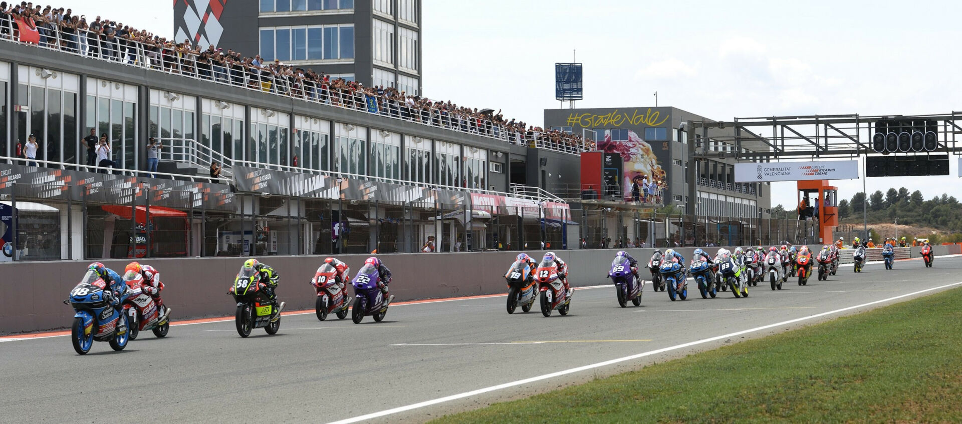 The start of FIM JuniorGP World Championship Race Two at Valencia. Photo courtesy Dorna.