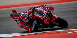Michele Pirro (51) in action on a Ducati Desmodici MotoGP racebike. Photo courtesy Ducati.
