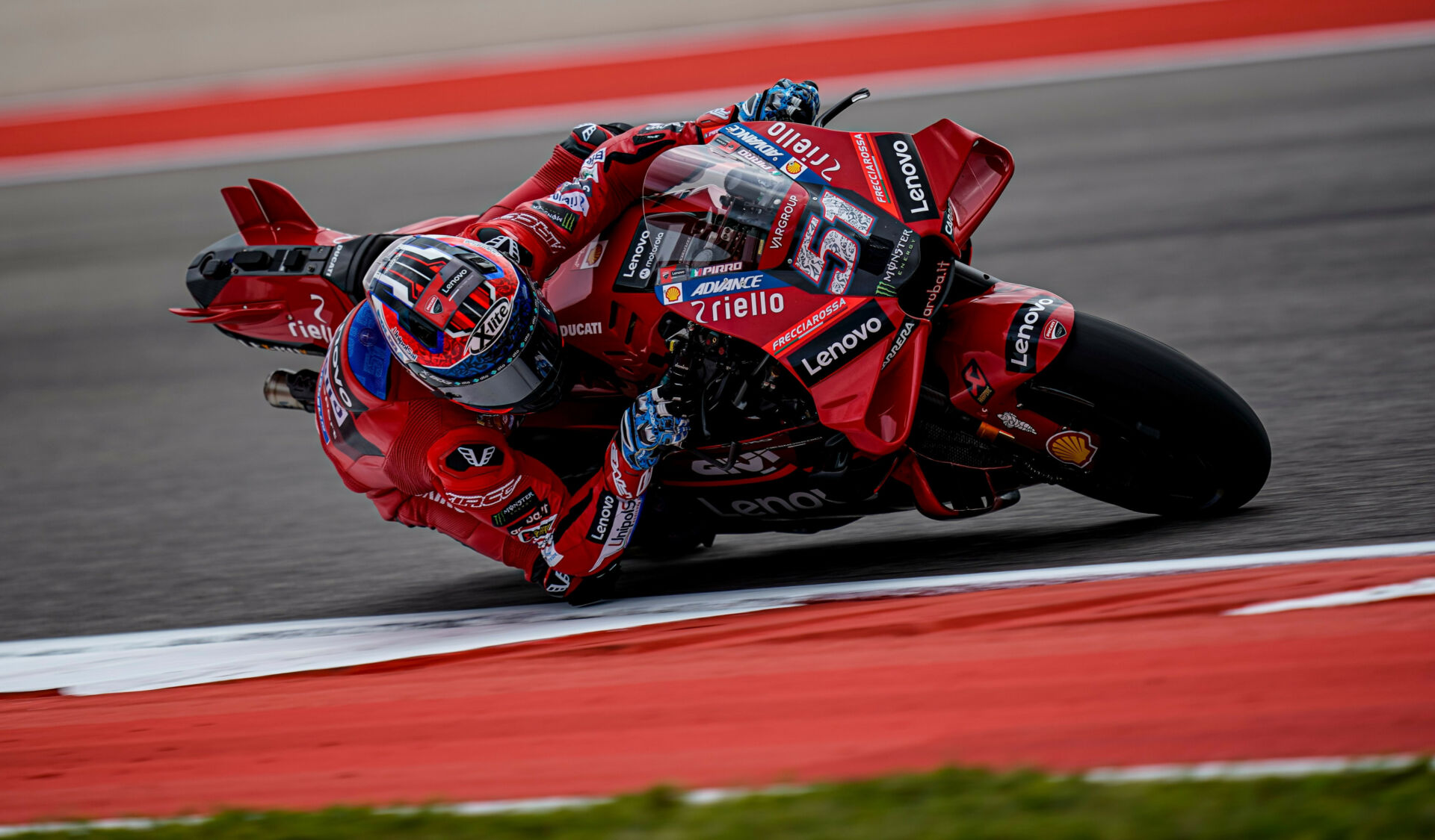 Michele Pirro (51) in action on a Ducati Desmodici MotoGP racebike. Photo courtesy Ducati.