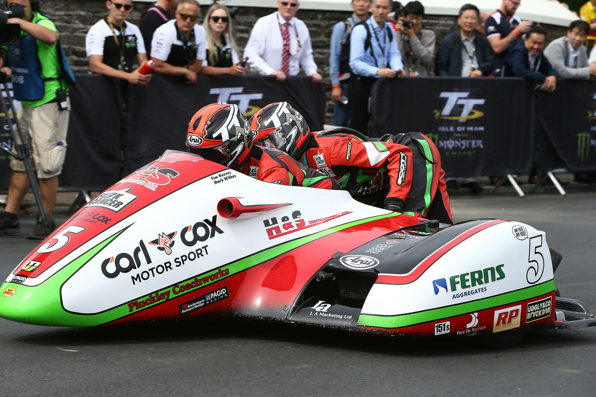 The Carl Cox Motorsport New Zealand Sidecar Team in action at the Isle of Man TT. Photo courtesy Carl Cox Motorsport and AHRMA.