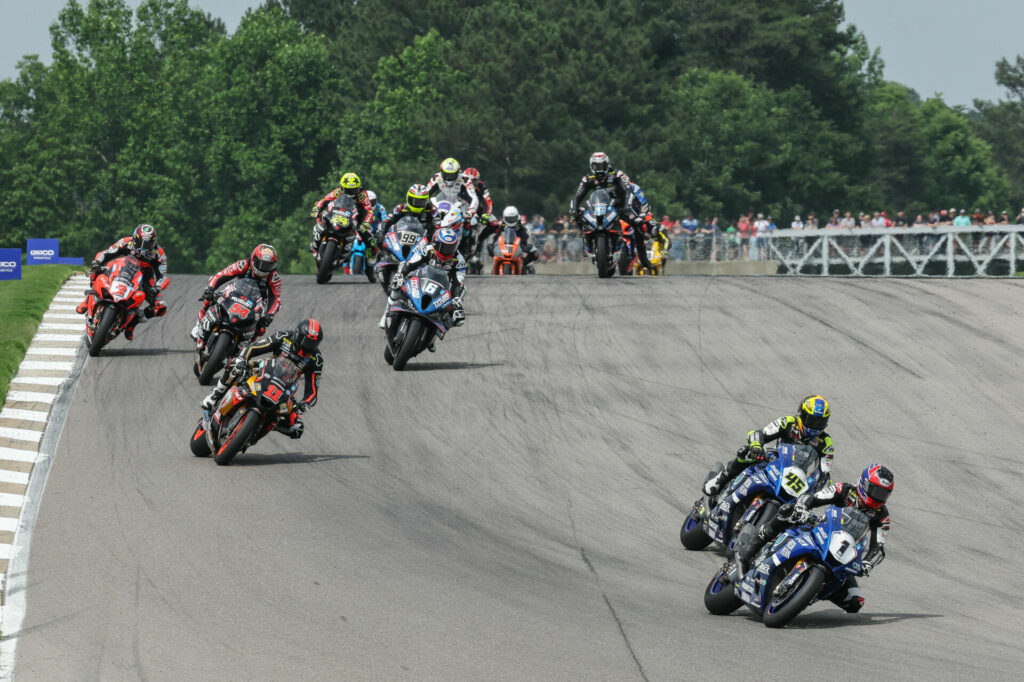 Jake Gagne (1) leads Cameron Petersen (45) into Turn Five on the opening lap of the Medallia Superbike race. Petersen would crash seconds later and Gagne would race away to victory on Sunday at Barber Motorsports Park. Photo by Brian J. Nelson, courtesy MotoAmerica.