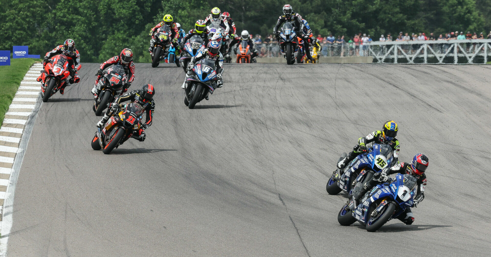 Jake Gagne (1) leads Cameron Petersen (45) into Turn Five on the opening lap of the Medallia Superbike race. Petersen would crash seconds later and Gagne would race away to victory on Sunday at Barber Motorsports Park. Photo by Brian J. Nelson, courtesy MotoAmerica.