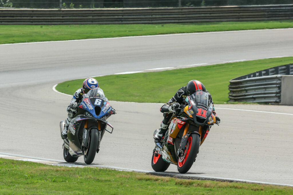 Mathew Scholtz (11) held off Cameron Beaubier (6) to take second in Race Two. Photo by Brian J. Nelson, courtesy Westby Racing.