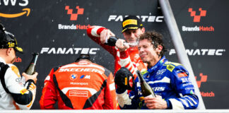 Valentino Rossi (right) enjoying a champagne shower at Brands Hatch. Photo courtesy Team WRT.