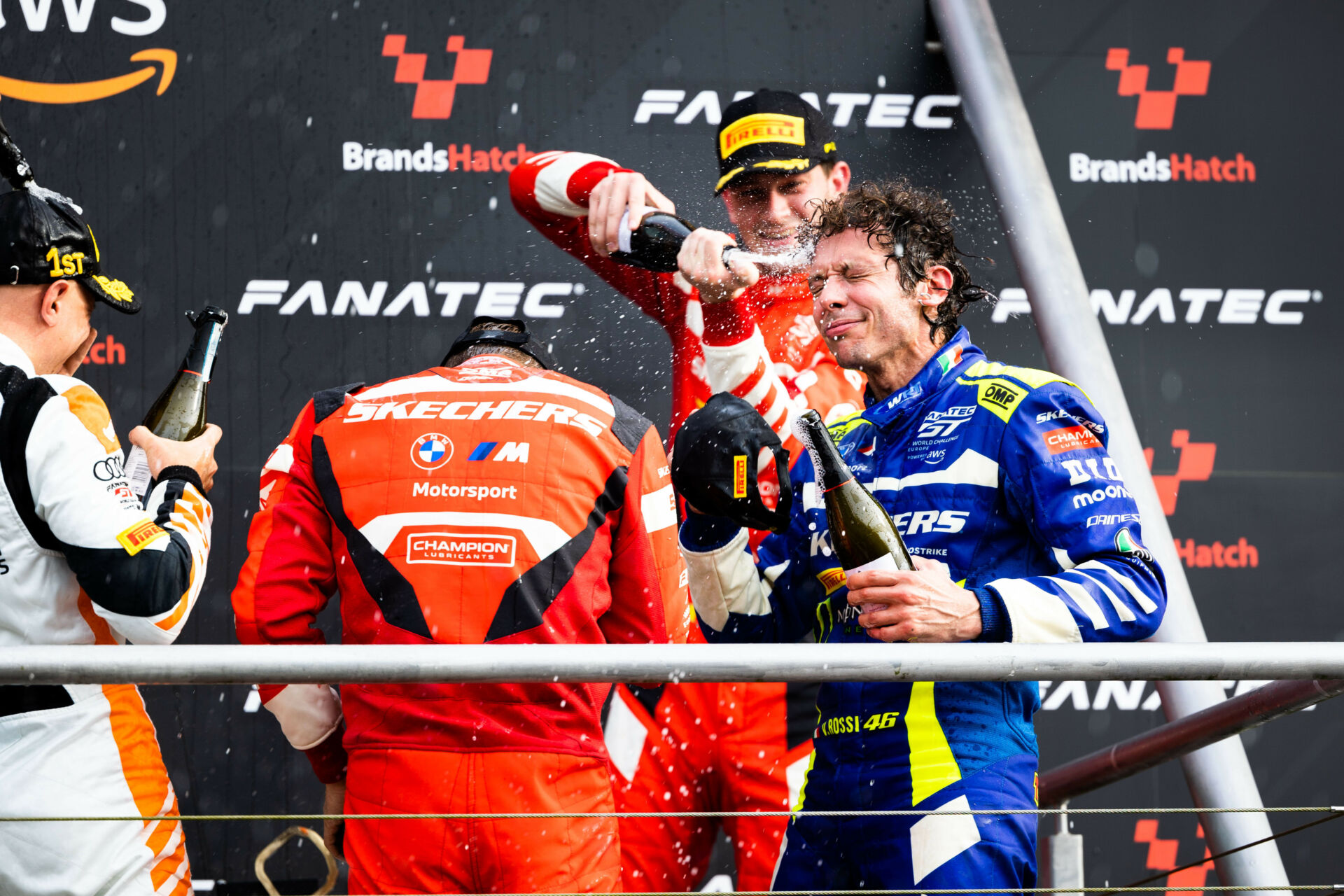 Valentino Rossi (right) enjoying a champagne shower at Brands Hatch. Photo courtesy Team WRT.