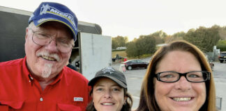 Walt Schaefer (left) with racer Melissa Berkoff (center) and race official Diane Shepard Tribou (right), before Schaefer retired from running his Michelin road race tire business in 2015. Photo courtesy Diane Shepard Tribou.