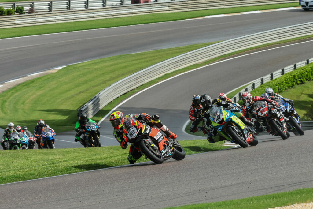 Xavi Fores (12) leads the "extended" Supersport race in tricky conditions Saturday at Barber. Photo by Brian J. Nelson, courtesy Ducati.